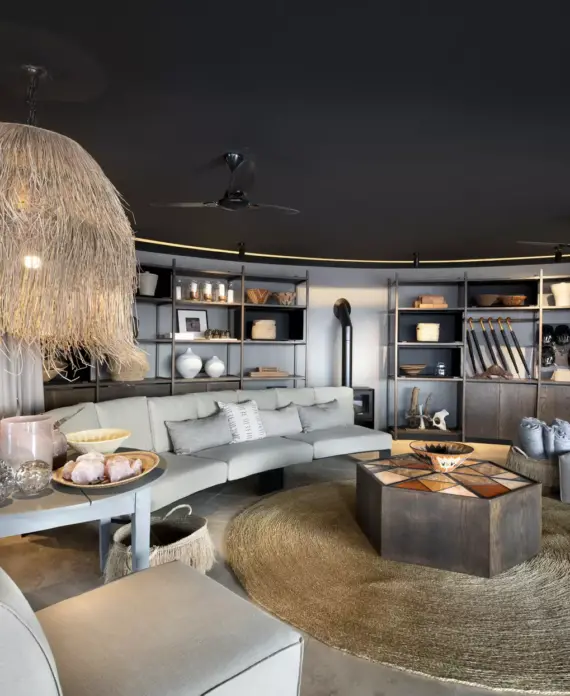 Stylish interior of andBeyond Sossusvlei Desert Lodge in Namibia, featuring contemporary decor with natural tones and desert-inspired accents.