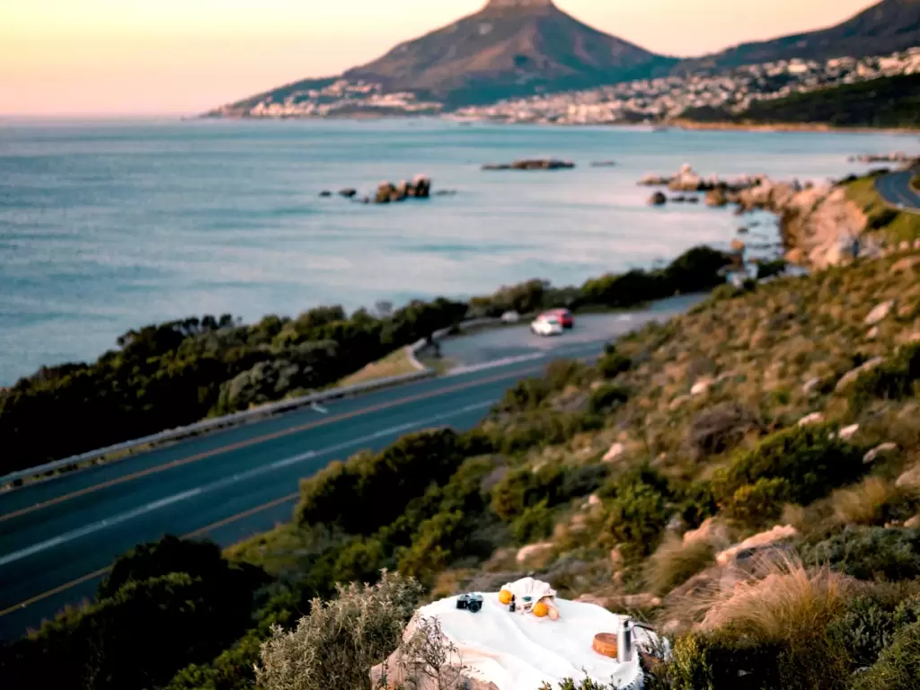 Sunset at Garden Route overlooking Lion’s Head and the Atlantic Ocean near Cape Town, South Africa.
