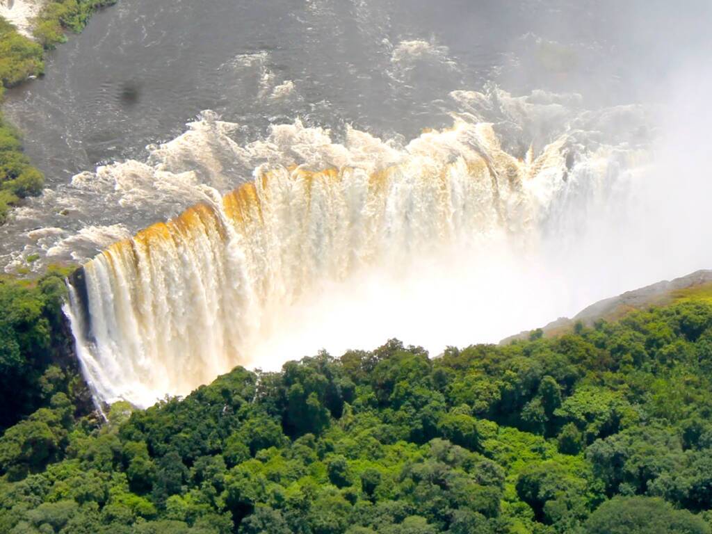 Victoria Falls, a Zimbabwe tourist attraction, cascading over the cliff 2025 – 2026. 