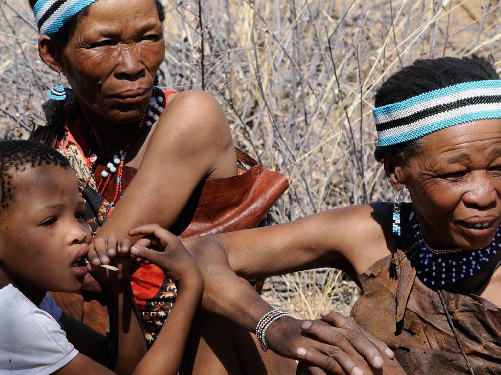 San Bushmen of Zimbabwe with traditional African attire and jewelry. 