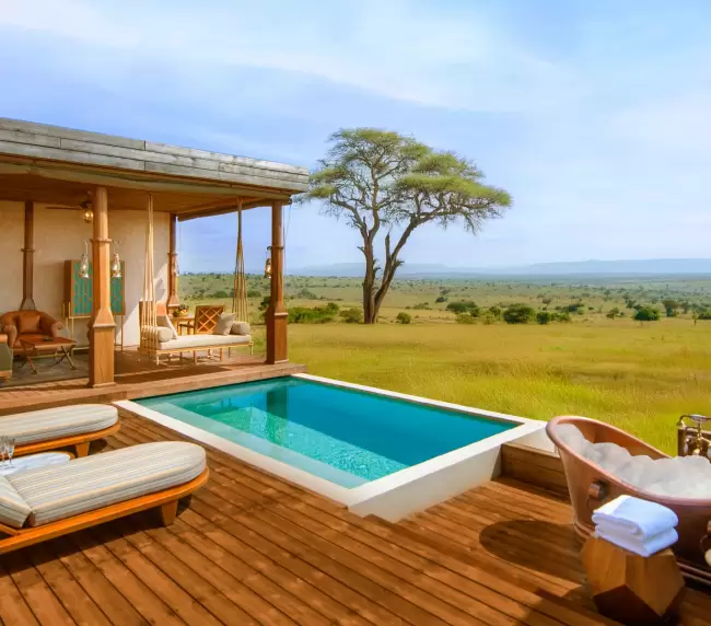 Luxury lodge at One Nature Mara River in Tanzania, featuring a private plunge pool overlooking the vast Serengeti plains.